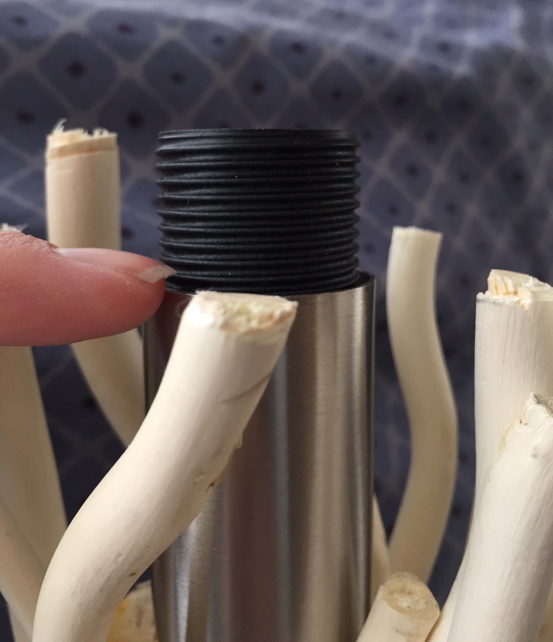 Measure and cut to the bottom of the threading on the lamp socket. 