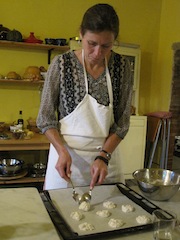 Alli prepares a tray of brutti e buoni to bake