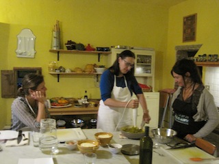 Candy purées the pumpkin for gnocchi, while Alli and Manul admire her style
