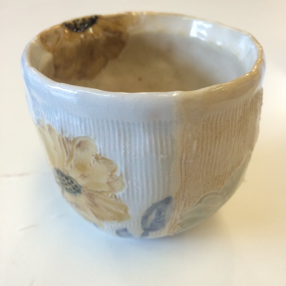 This little cup is pinched porcelain with some of my first 'mapped glazes' made as a intern at Anderson Ranch Arts Center