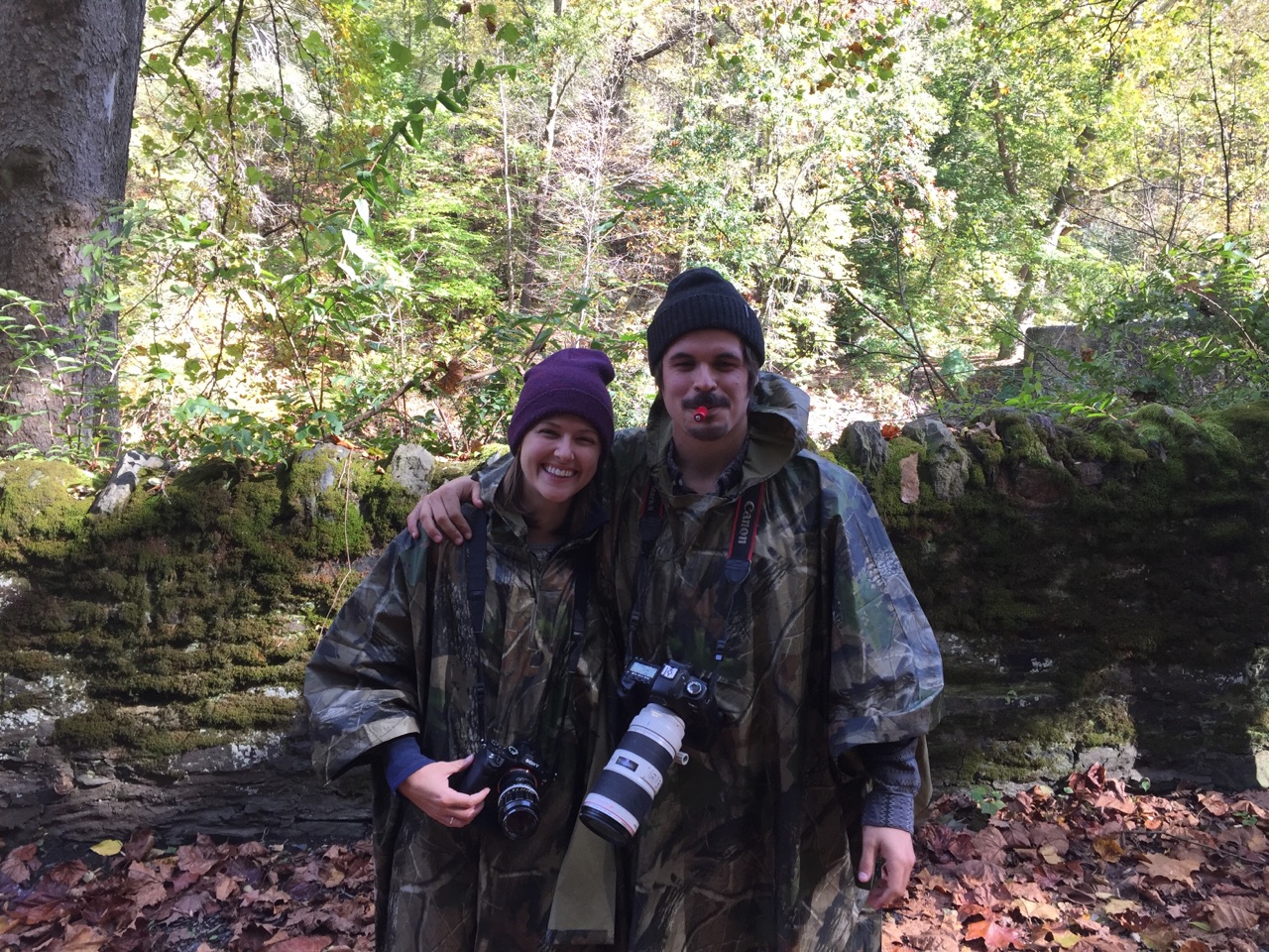 Your photographer couple. Looking forward to using this camo + bird caller to be even more discrete than you thought was humanly possible. Available for outdoor engagements, funerals, divorces, and births worldwide! We're your last-minute videographers, but never your last-choice!