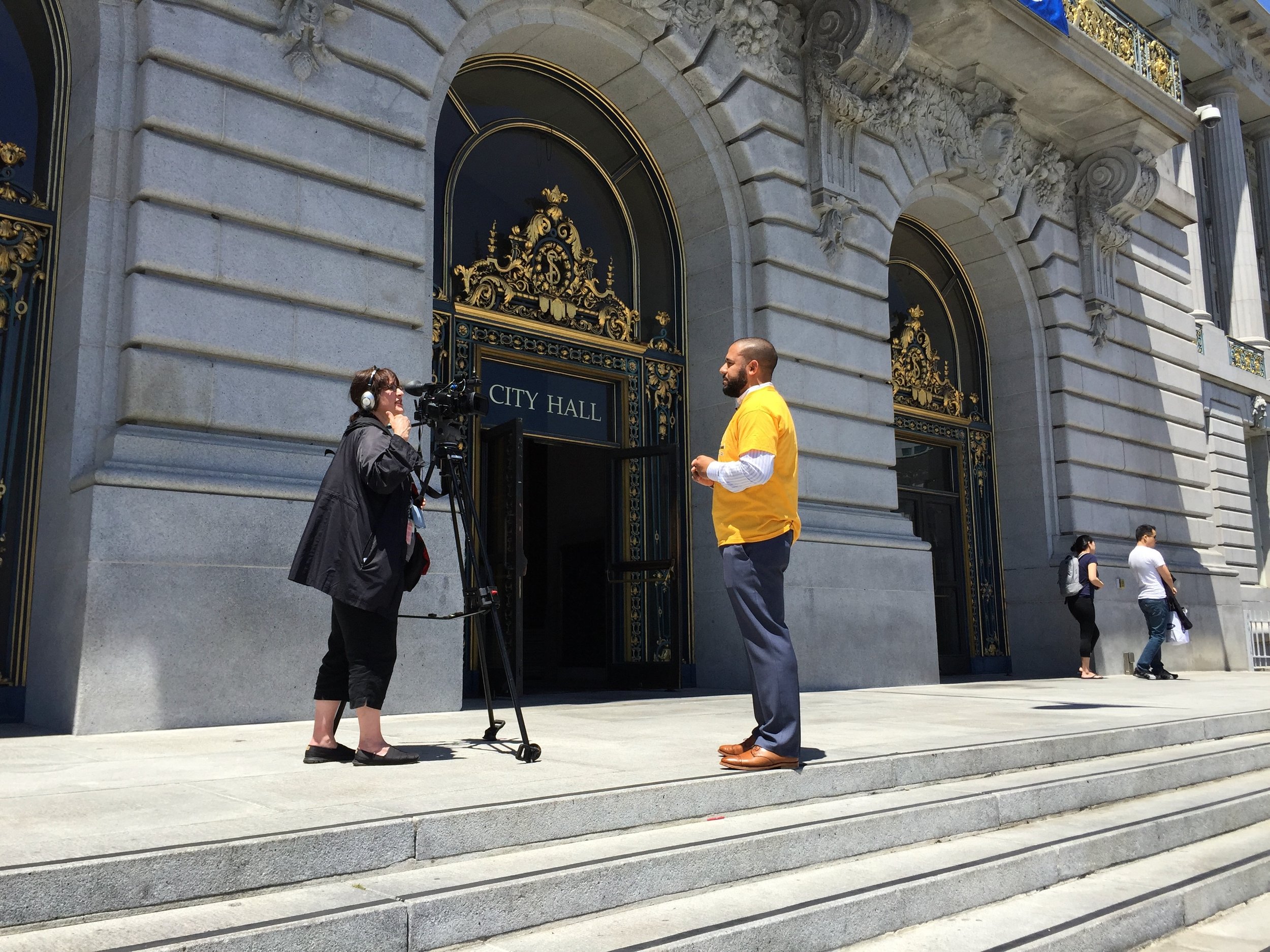 Jason doing an interview at San Francisco City Hall