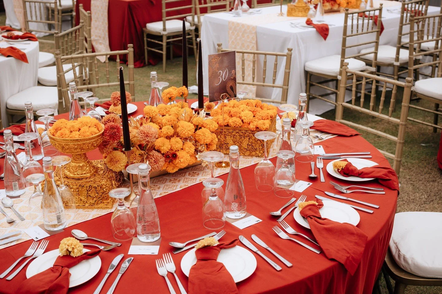 The beautiful Taman Bhagawan gave us all the inspiration we needed when we started mood boards for an Awards Gala event for 500. The rich brick reds, the Ramayana stories carved into stone, the big trees and lawns. The clients requested marigolds wit