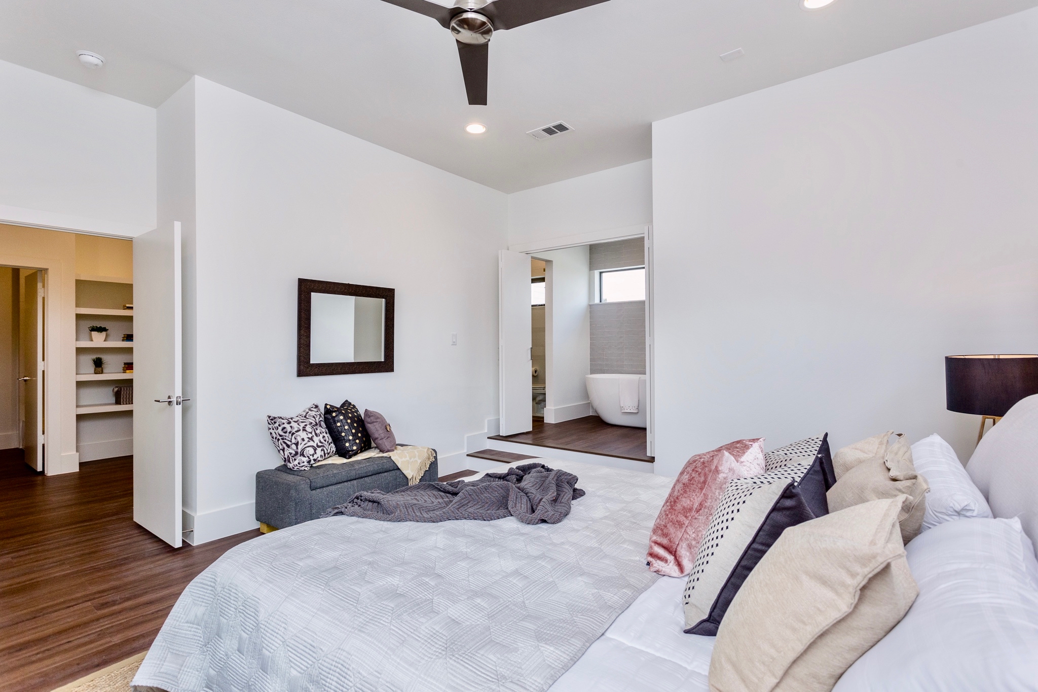  The elegant master bedroom invites relaxation. 