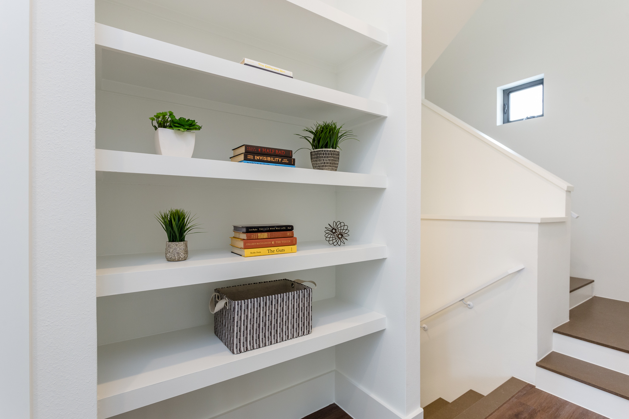  Just outside the bathroom, you'll find stylish shelving. 