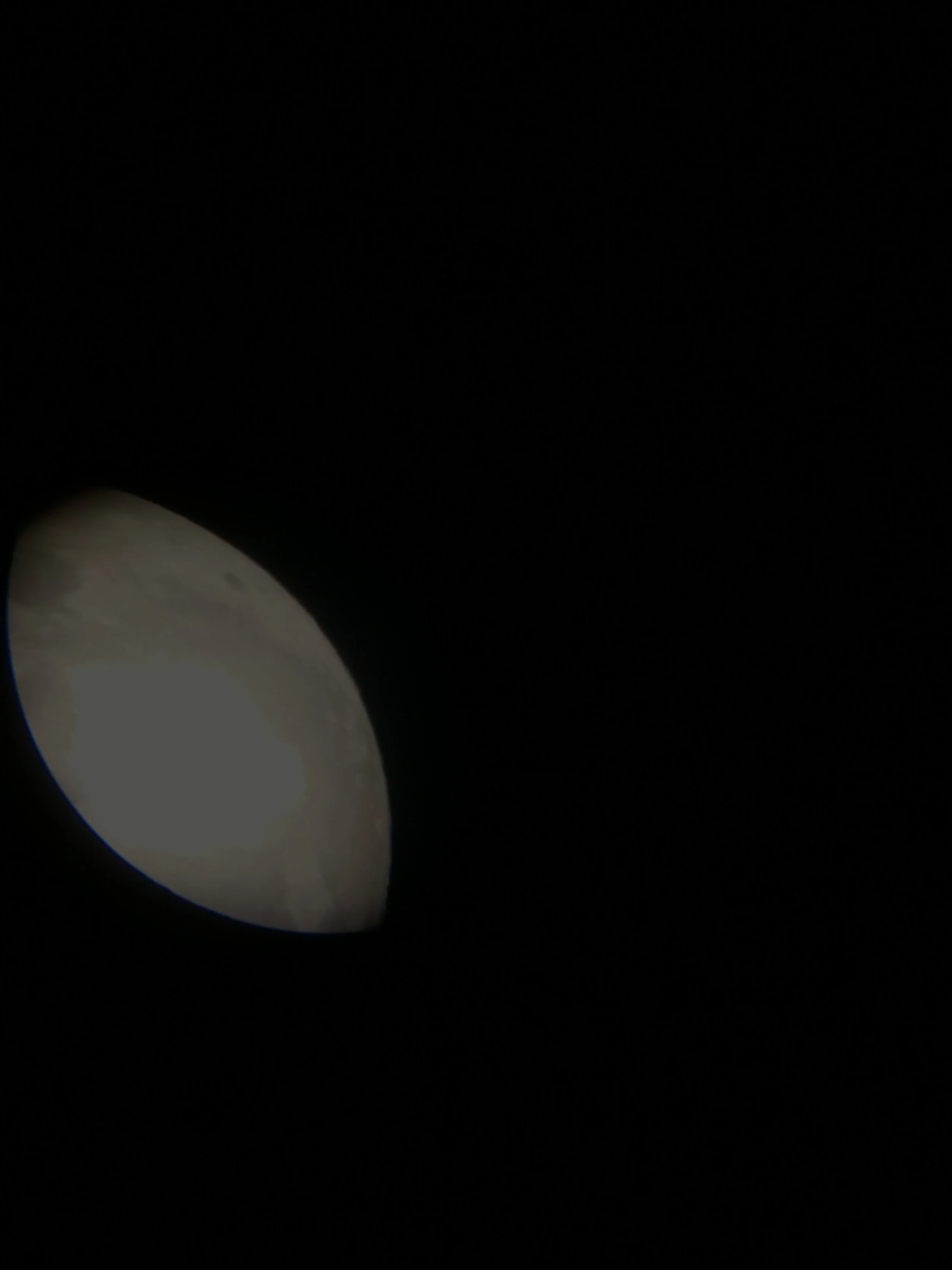 And then I tried something I've never done before and held my iPhone 7's camera up to the viewfinder of my telescope. Here's the moon.