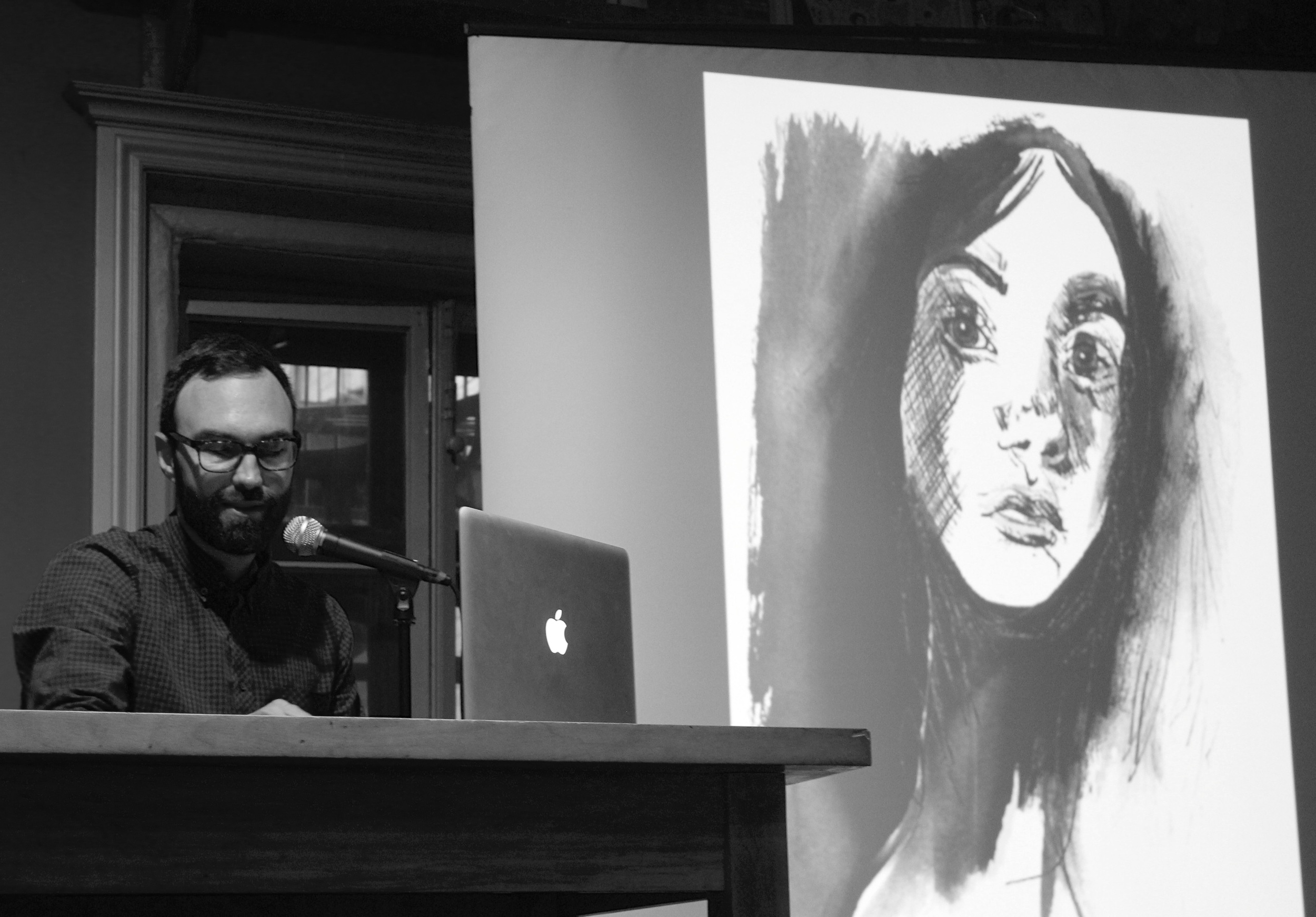 Me reading with one of Nicole's illustrations.