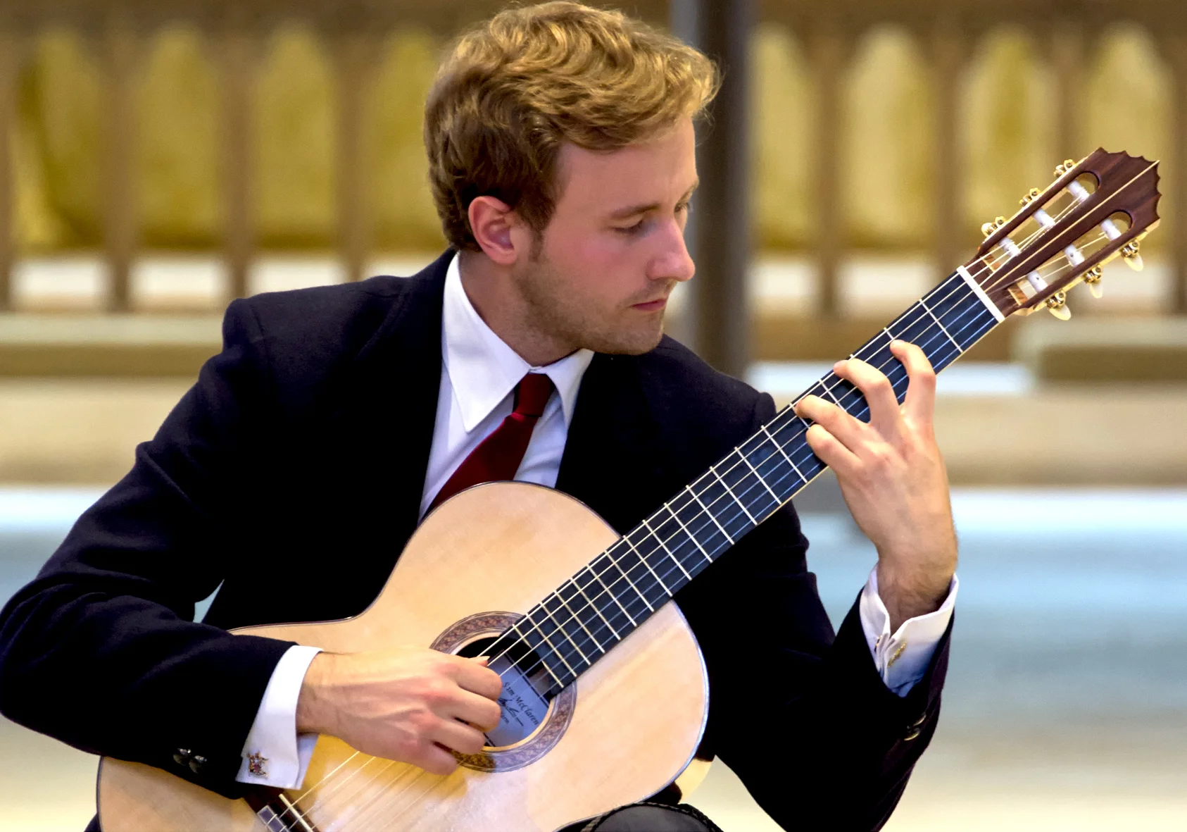 Michael Christian Durrant performing on his Sam McClaren concert guitar
