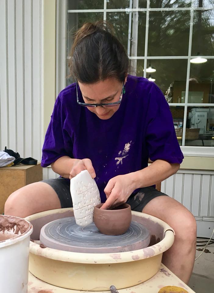 Adding Texture to a cup thrown on the wheel. photos by Wendy Chin