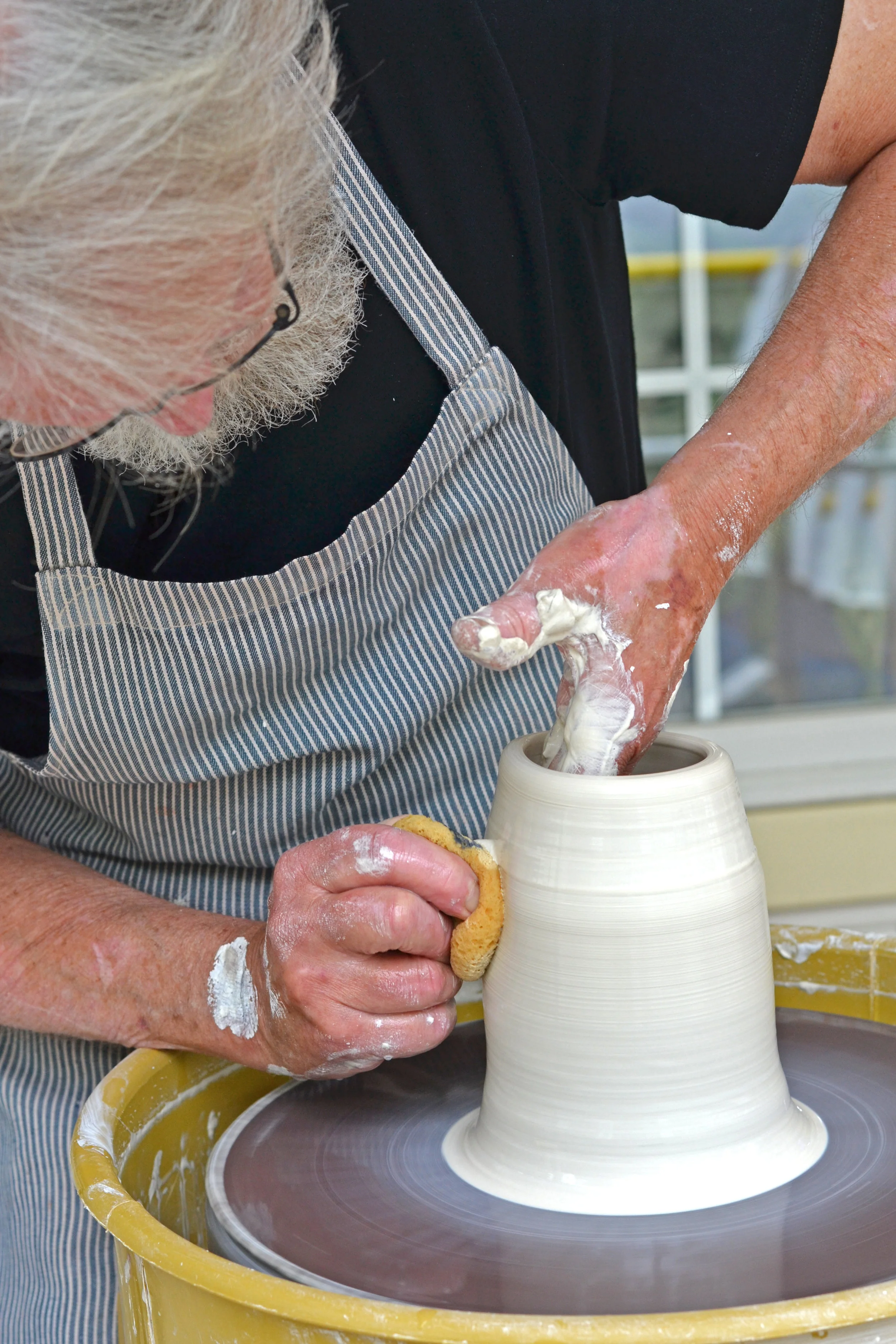 Bob Chaundy throwing on the wheel.