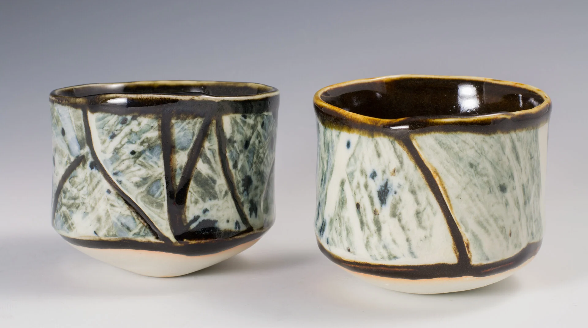 Round Bottom Cups with Slip Decoration, Fired in a gas kiln