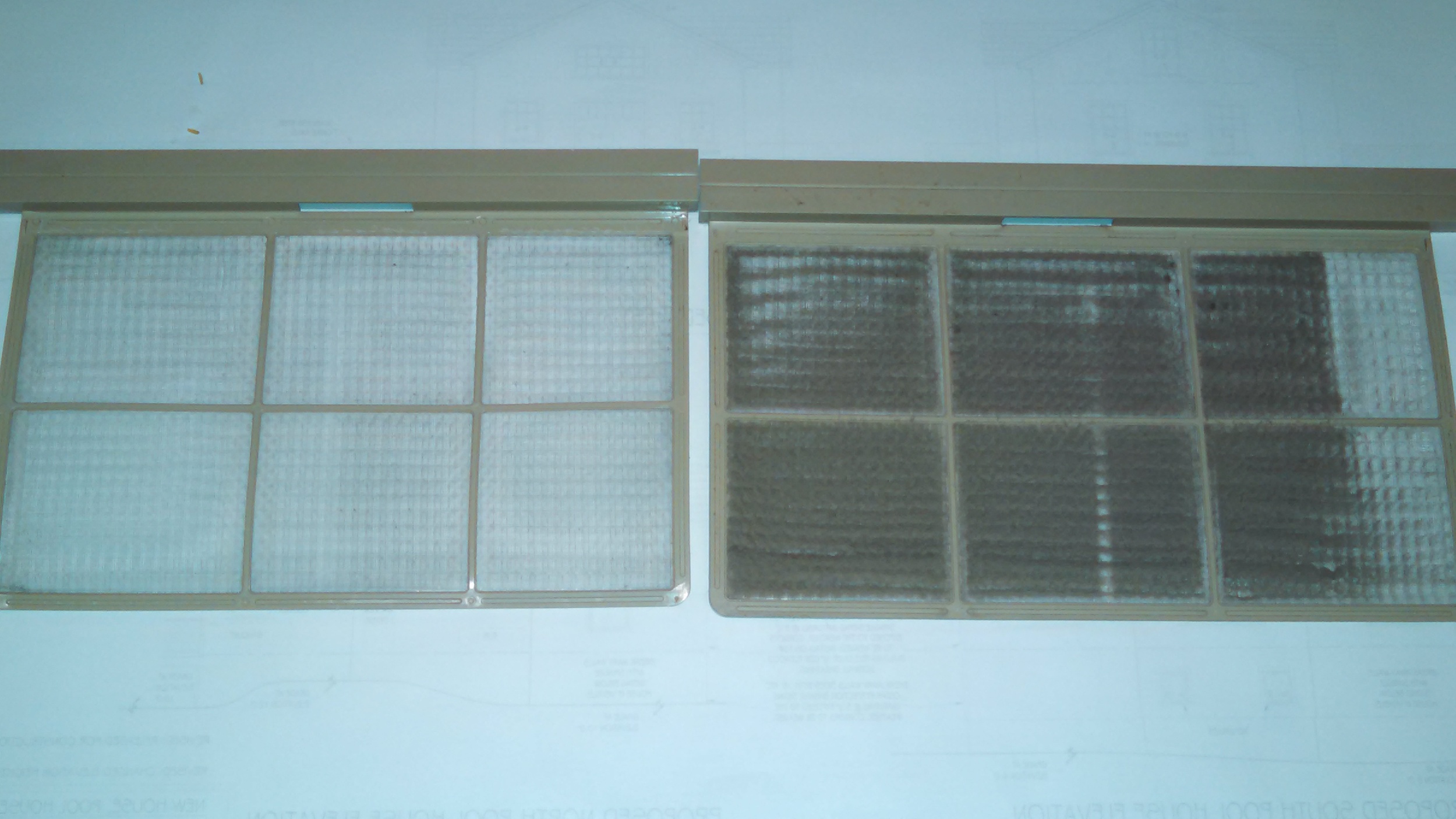 Two filters from my daughter's through-wall air conditioner - one before and one after cleaning