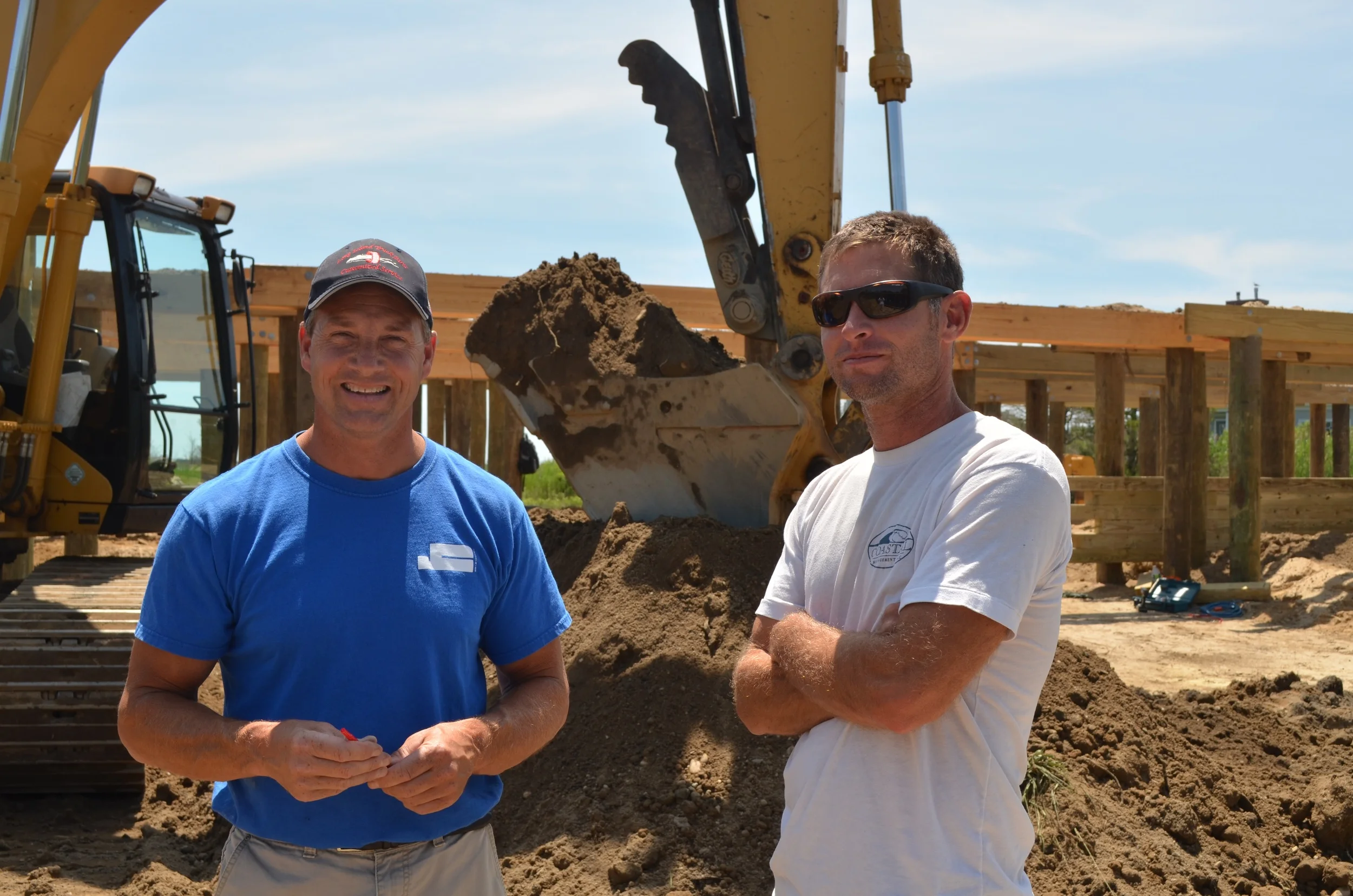 Tom Freund (left) and Chris Mensch (right) at the Sunset Green Home project site
