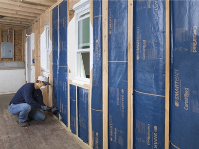 CertainTeed's SMARTBATT with smart vapor retarder will be installed to R-21 in Sunset Green Home's exterior walls (photo courtesy of CertainTeed)