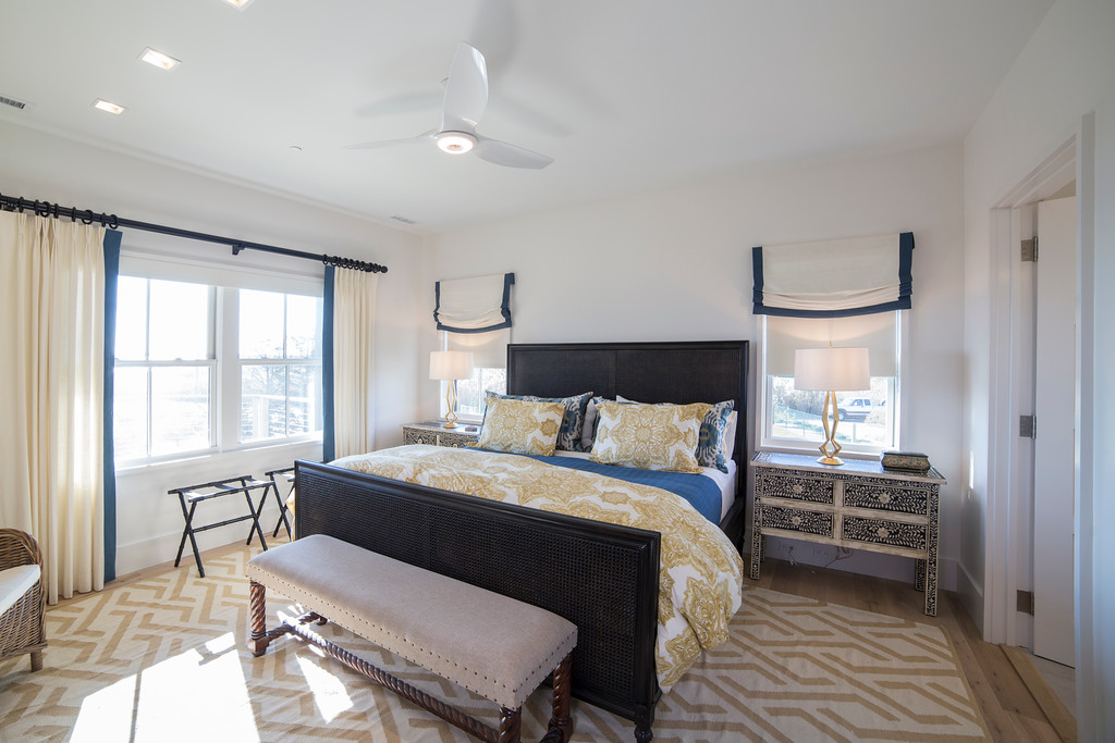 Big Ass Fans' Haiku with LED lighting and SenseME technology in one of Sunset Green Home's bedrooms