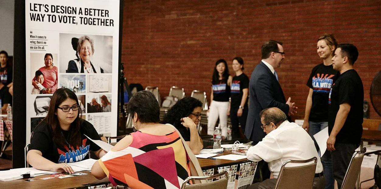 Working as a "Poll Worker" and user-testing our designs in LA.