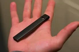 Picture courtesy of Wikimedia CommonsJuul’s small, compact design hides easily into the palm of a hand. Juul came under a lawsuit in November, one of many filed previously, accused of teenager-focused marketing practices.