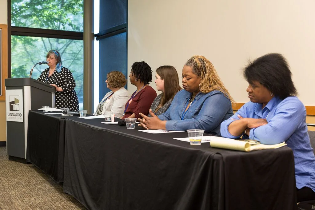 Breakout session with YWCA's Housing Services Team. William Wright photo.