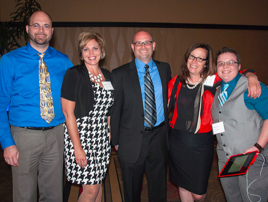 Above: Marci Volmer (second from left) served as LSC's graduation event emcee in 2015.