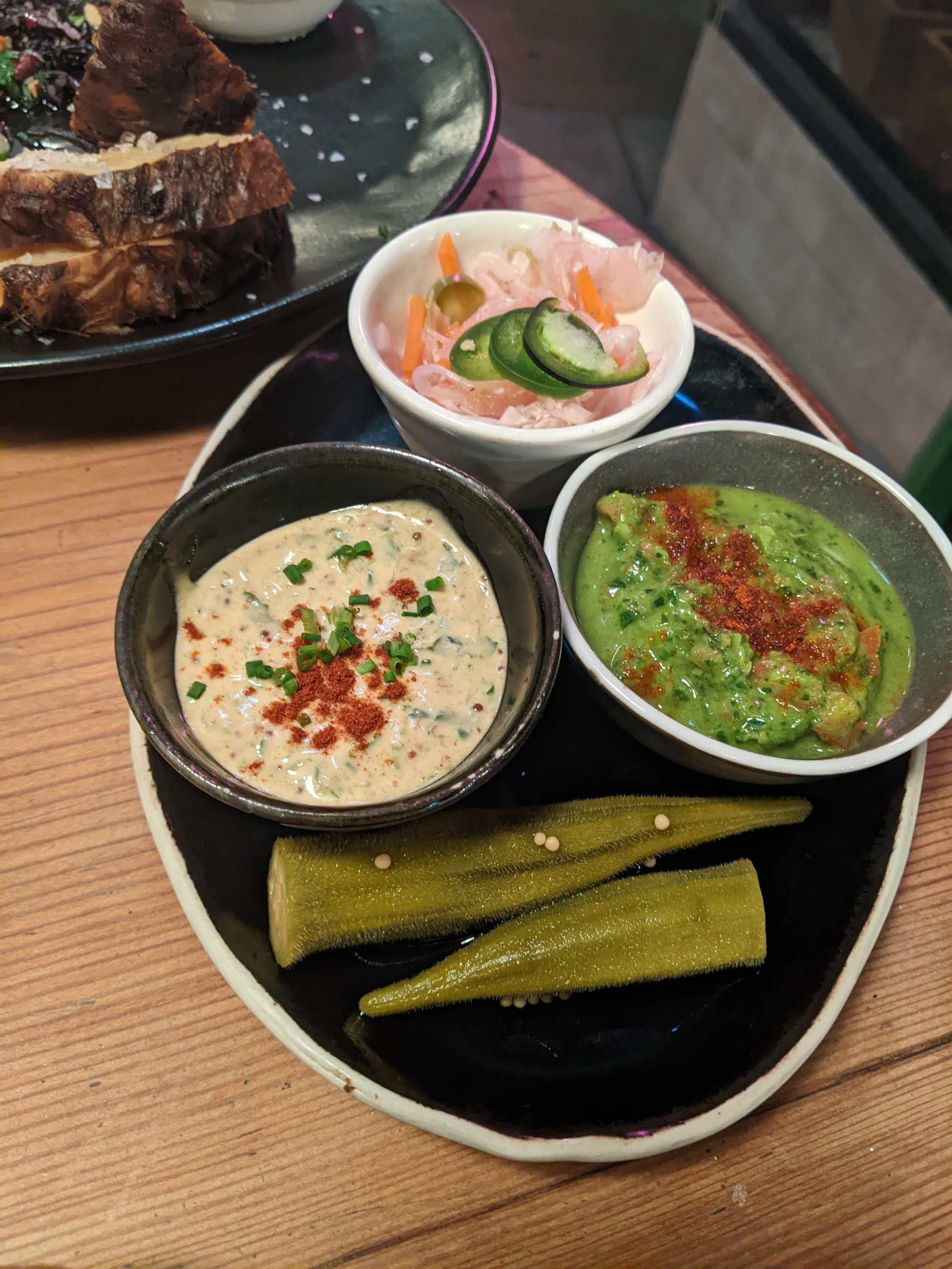 Pickled okra, Creole remoulade, pebre, and curtido