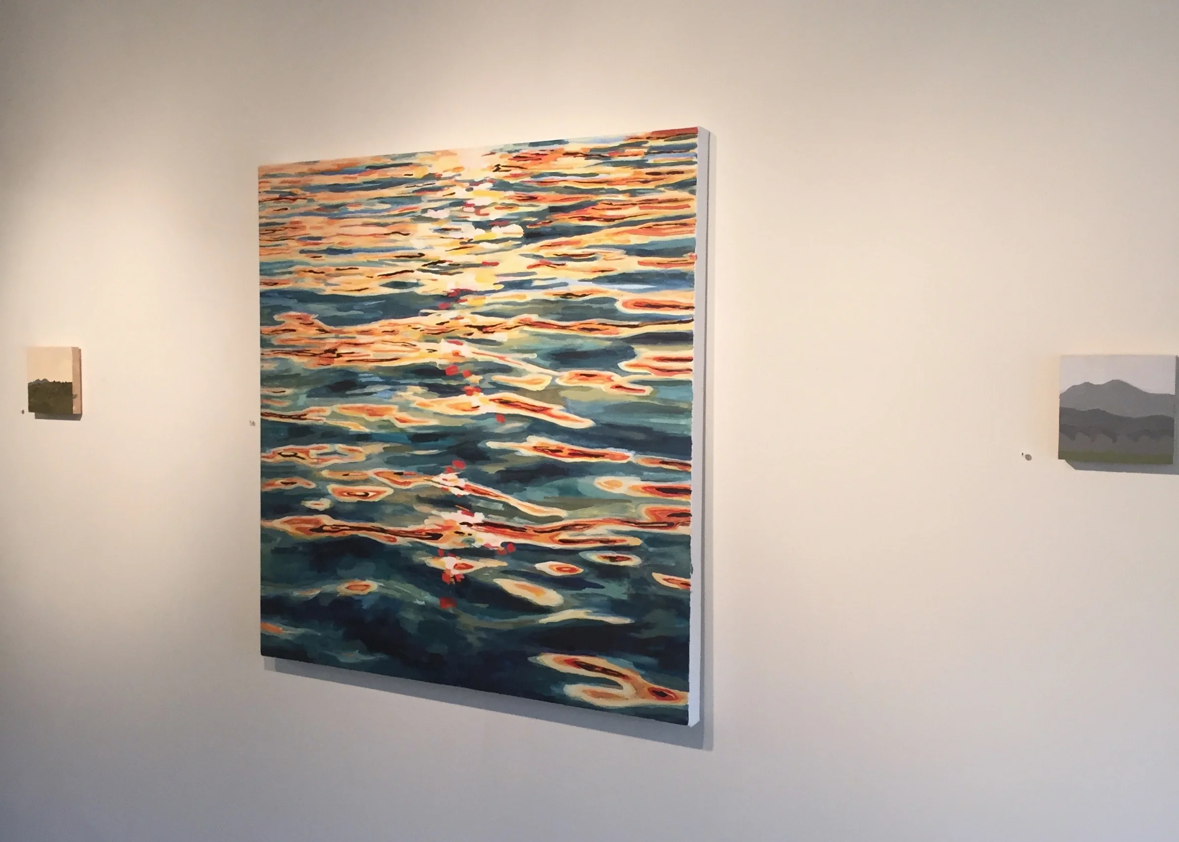 My painting, Gleam, between two pieces by Ed Bopp.