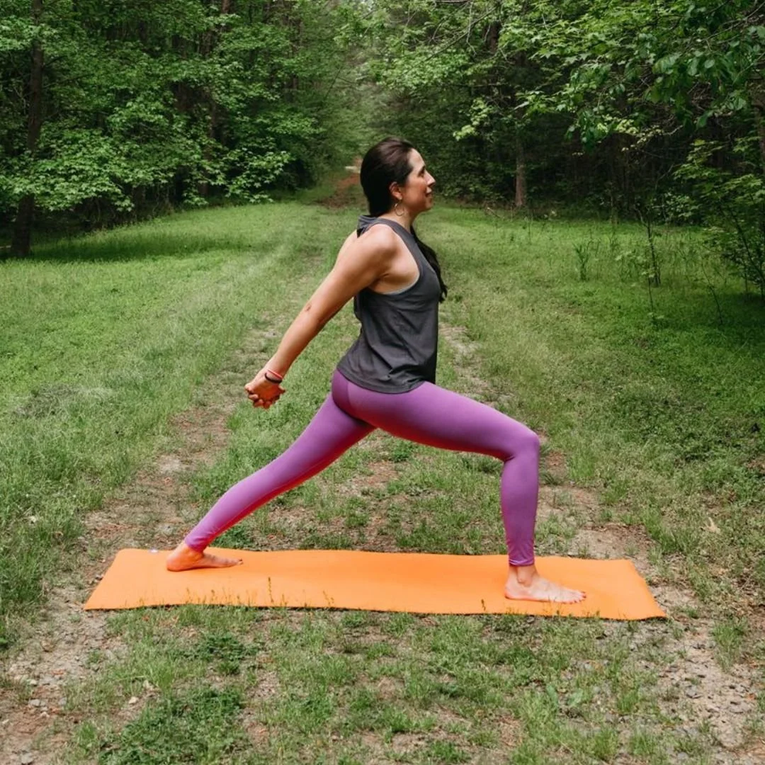 holding warrior 1 yoga pose isometrically
