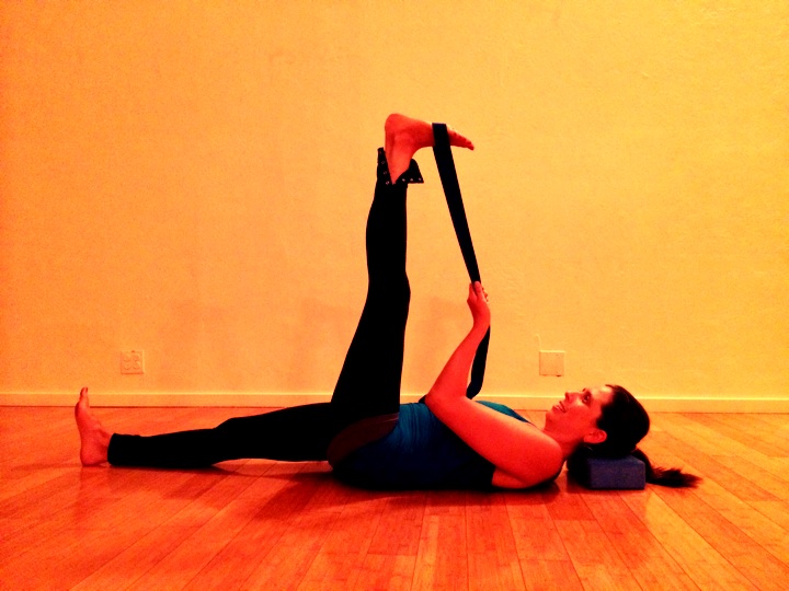 Supta padangusthasana with a strap - an improvement over the big toe hold, but not the end of the story...