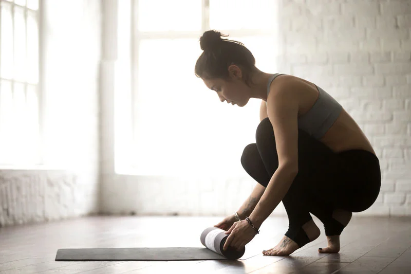 rolling-up-yoga-mat.jpg