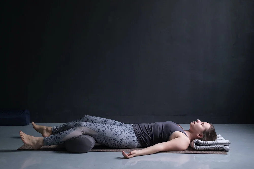 savasana with bolster.jpg