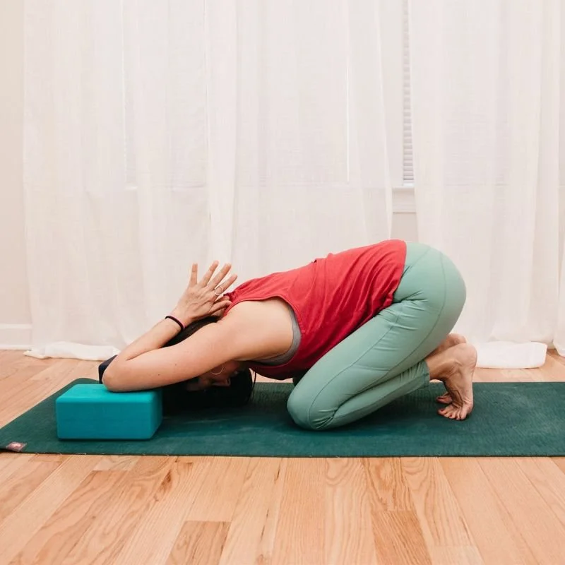 a picture of a child's pose variation