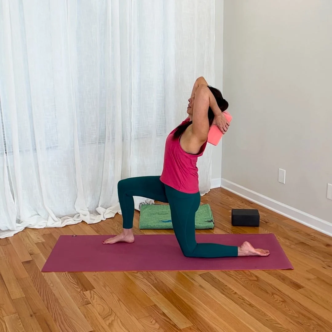 a thoracic spine backbend with a yoga block