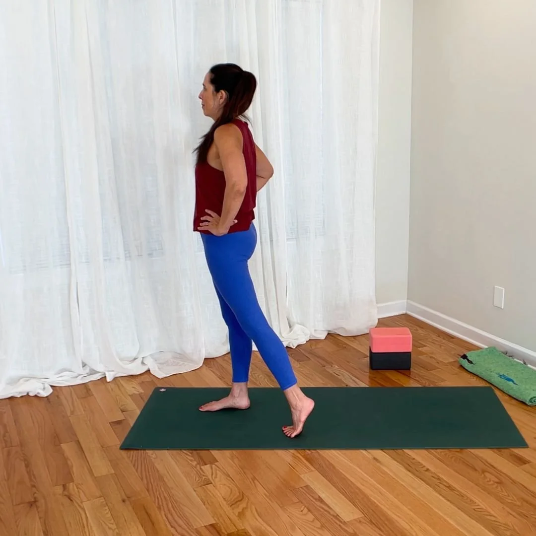 Woman demonstrating hip extension by moving thigh backward relative to pelvis