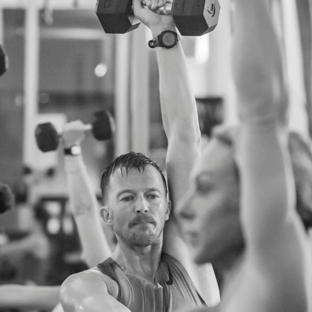 yoga movement class with a dumbbell