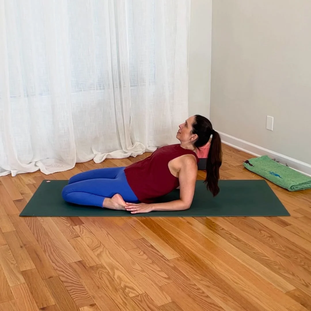 Supta virasana reclining hero pose supported on forearms