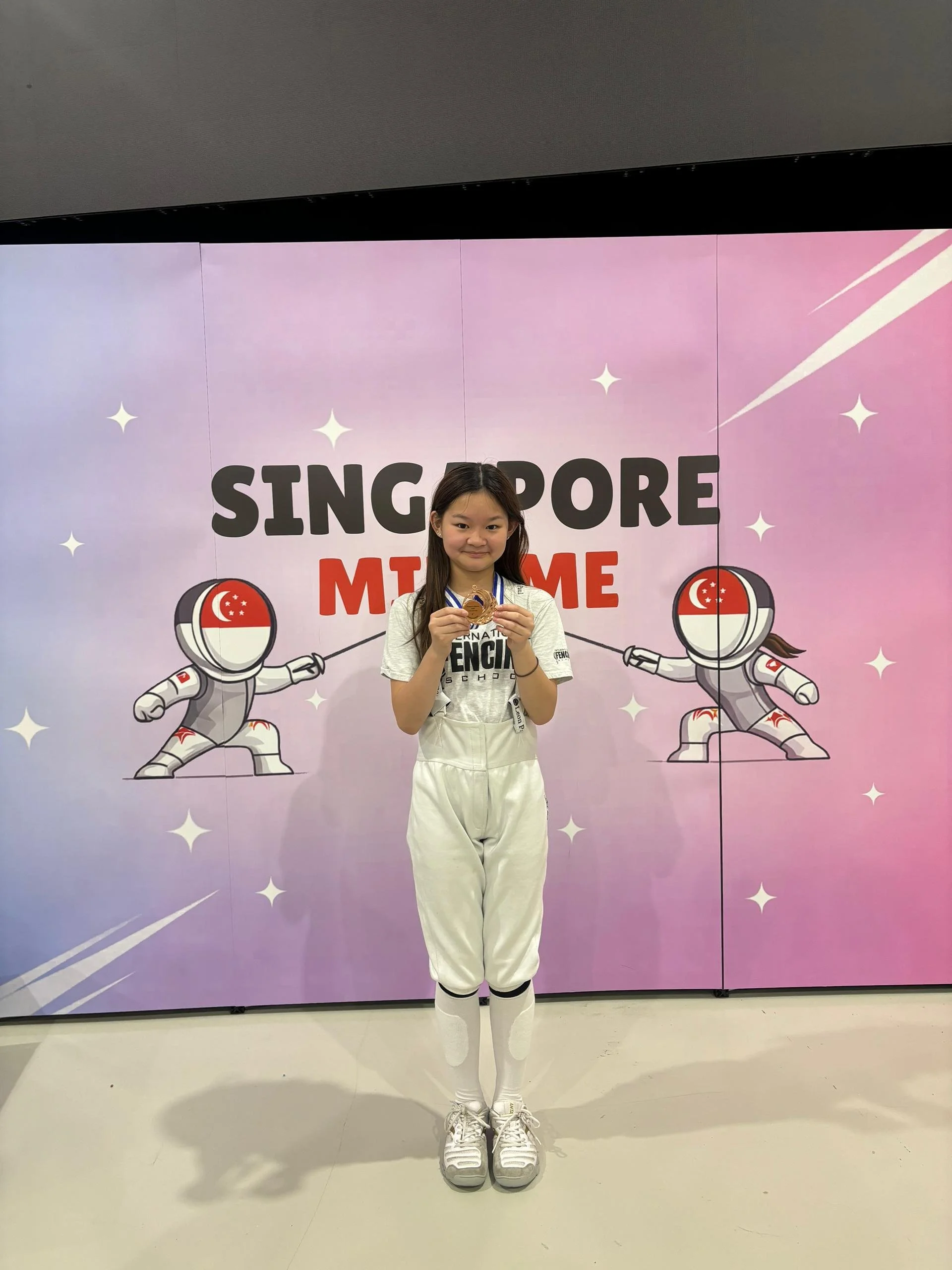 Cang Ellie - Bronze in individual U12 Women’s foil.jpg