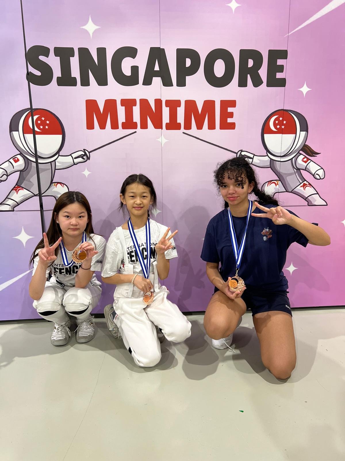 Bronze, 5th and 7th in U12 individual Women's epee.jpg