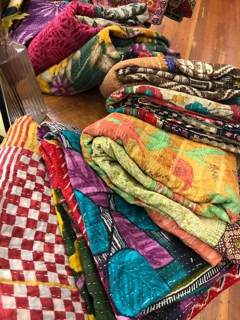 Beautiful assortment of colorful Kanta quilts