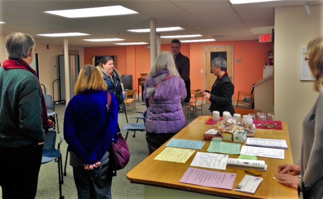  Community members participating in a housing information session that included a guided tour of the One-Stop Resource Center's facilities. 