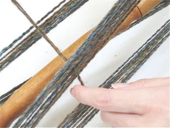Once you have finished skeining the yarn, secure both ends.