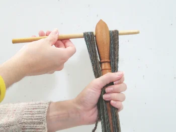 Alternatively, you may partially remove one of the arms by gently twisting it out of the hole.