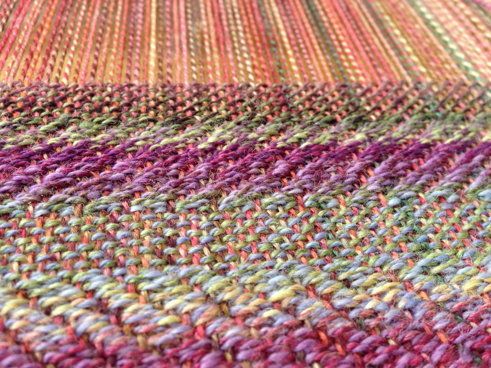 Current weaving project that combines a straight twill with plain weave. Warp and weft are both my handspun yarn.