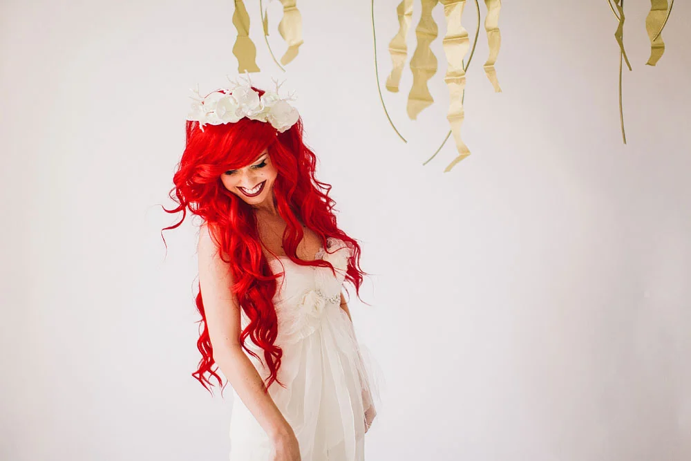 I had the honor of being a contributing vendor and model for Your Cloud Parade 's "Little Mermaid"-inspired Mer Wedding shoot! So many talented people and designers came together to create this magical Disney lover's dream! I created custom headpieces for the bride and bridesmaids - all of which can be purchased exclusively in my Cloud Parade shop . This editorial has been featured on PopSugar , Huffington Post , Cosmopolitan , Disney's style blog among many others. Photographer - Mark Brooke Photography / Mathieu Photography Hair accessories - Creature of Habit Bride model - Traci Hines Hair and makeup - 1011 Makeup Wedding gown - Claire la Faye Wedding stylist - Lauren Grey