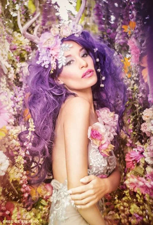 Model Vanessa Elaine (Creature of Habit founder) modeling the Tropics Gown and an original antler headdress for the flowery series "Garden Creatures" shot by Greg De Stefano and conceptualized by Jessica Dru .