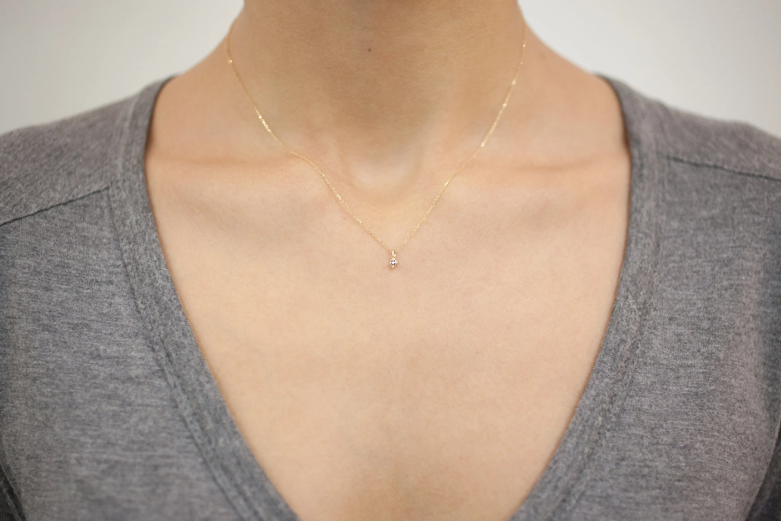 kite necklace on neck.jpg