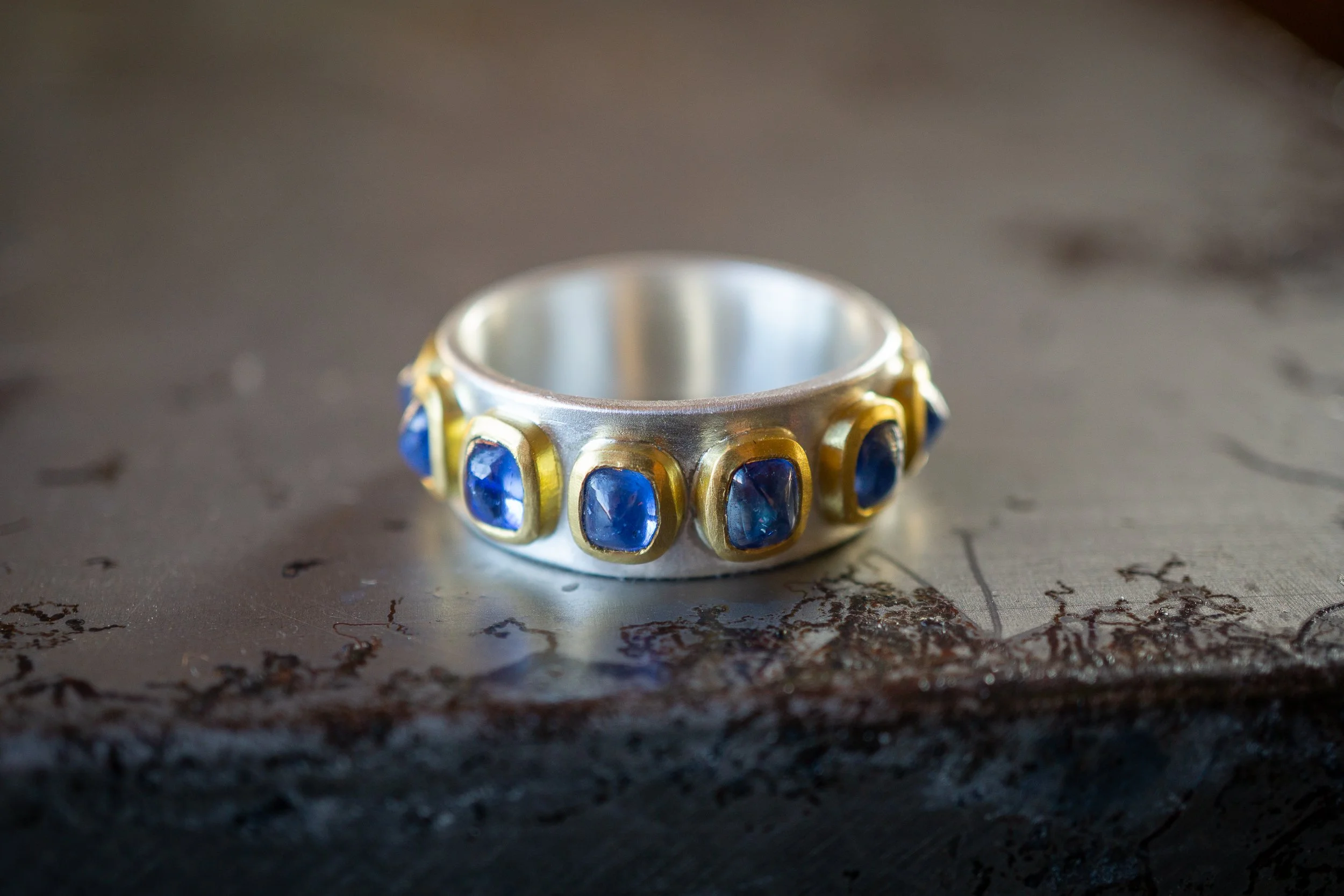 Pleiades Ring, detail of 22 karat gold, fine silver, stones.