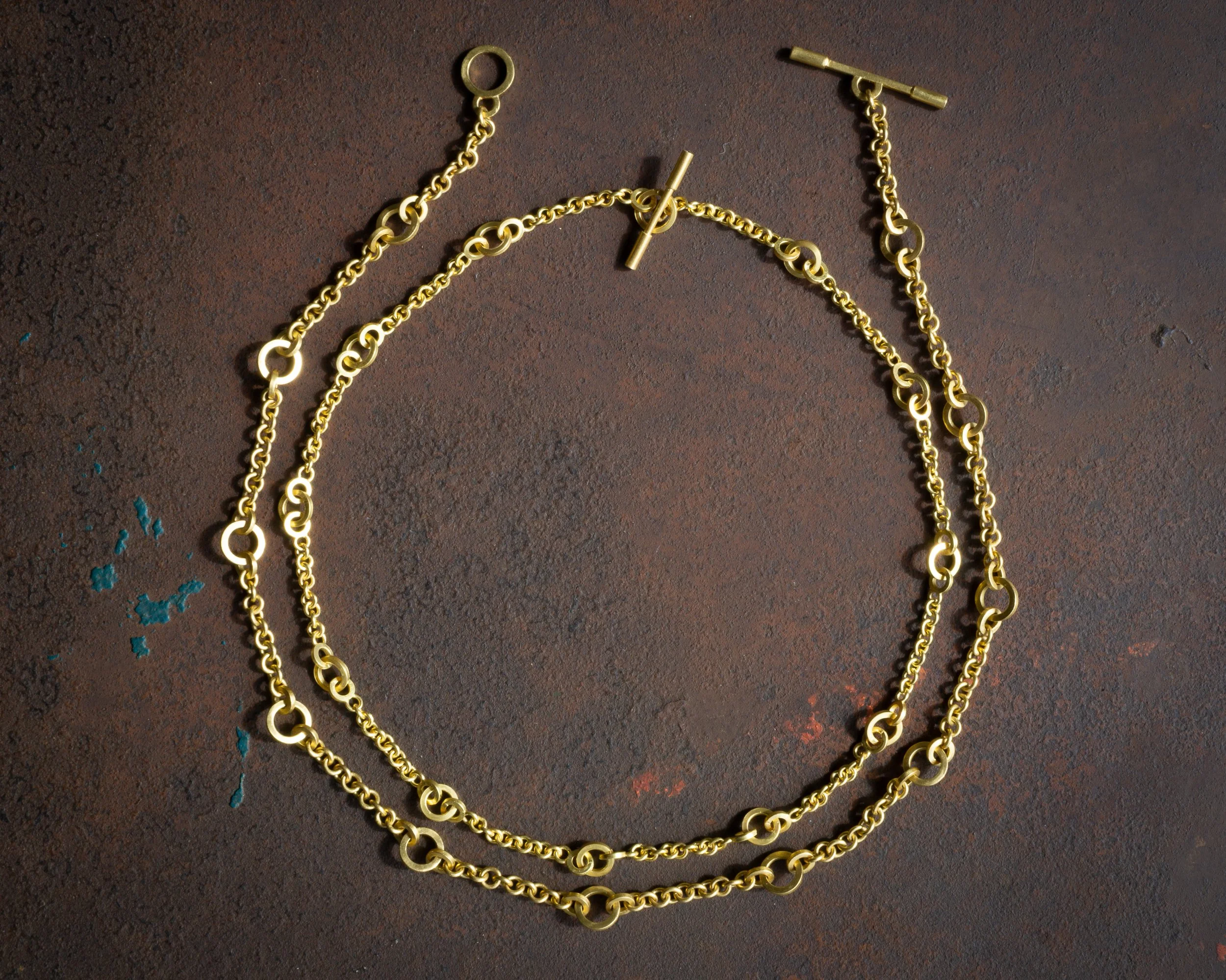 Triadic Chain, shown in two dimensions, full view of both on tabletop.