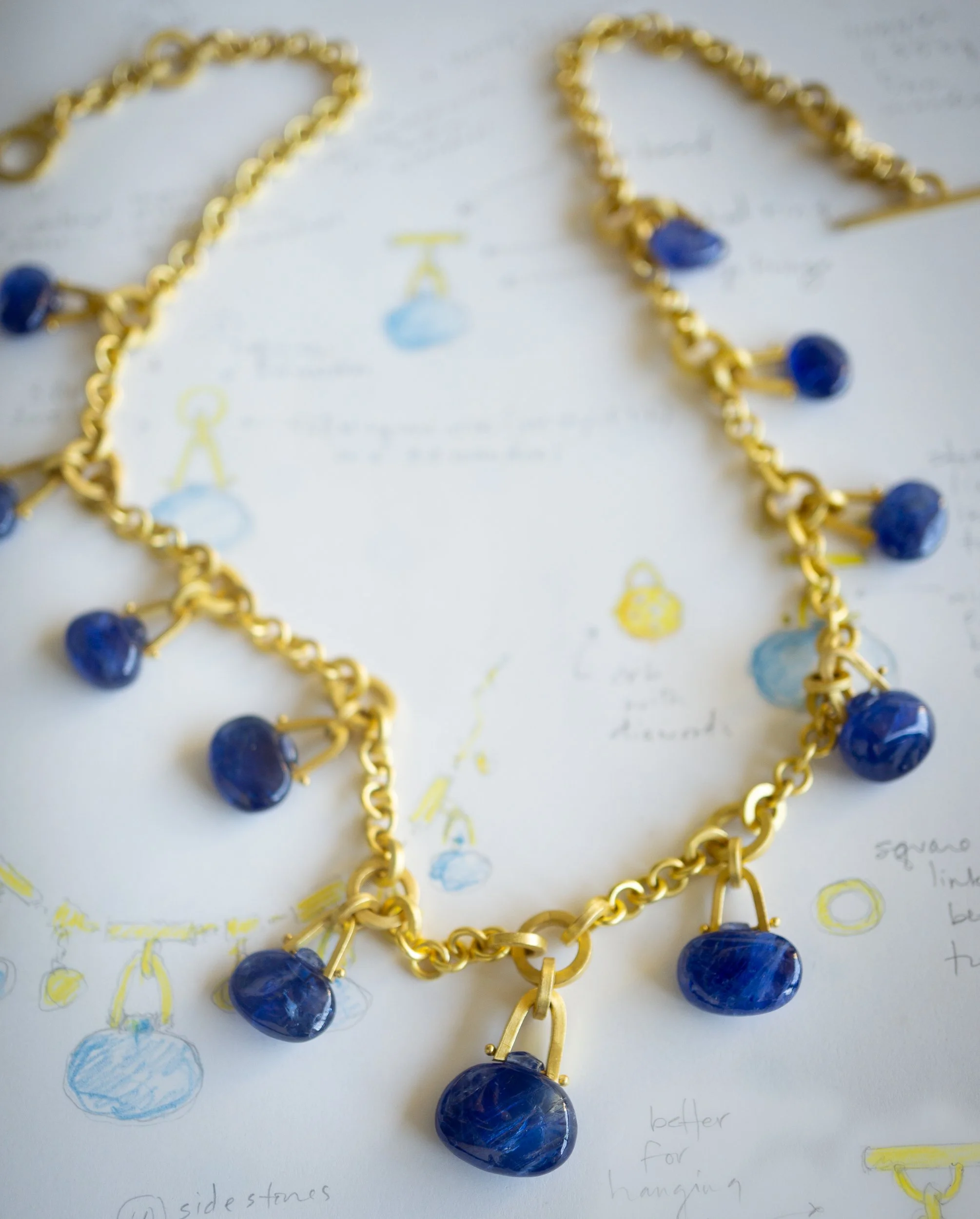 Tabiz Necklace in 22k gold with drawing.