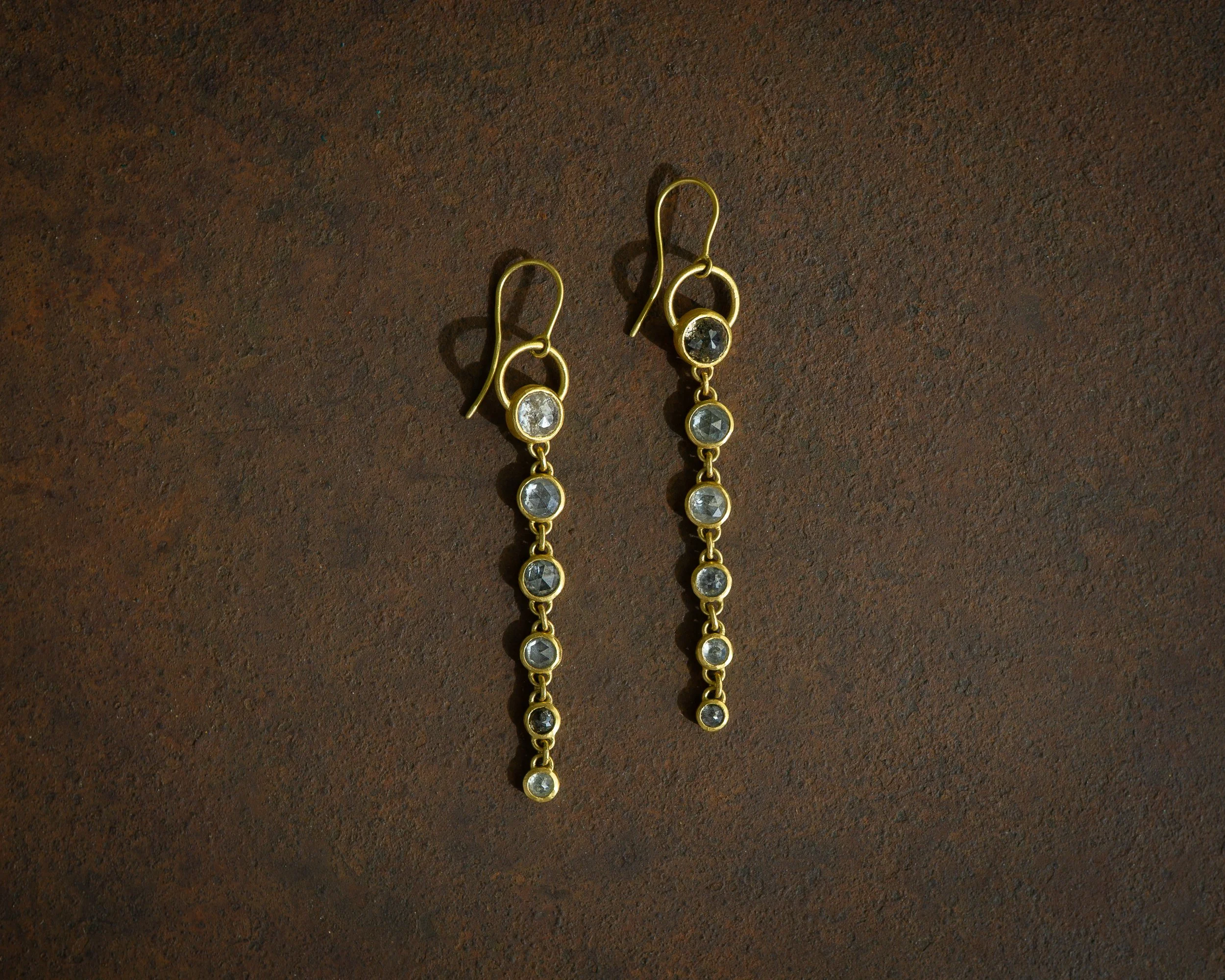 Dusk Earrings in 22 karat gold and rustic salt and pepper diamonds.