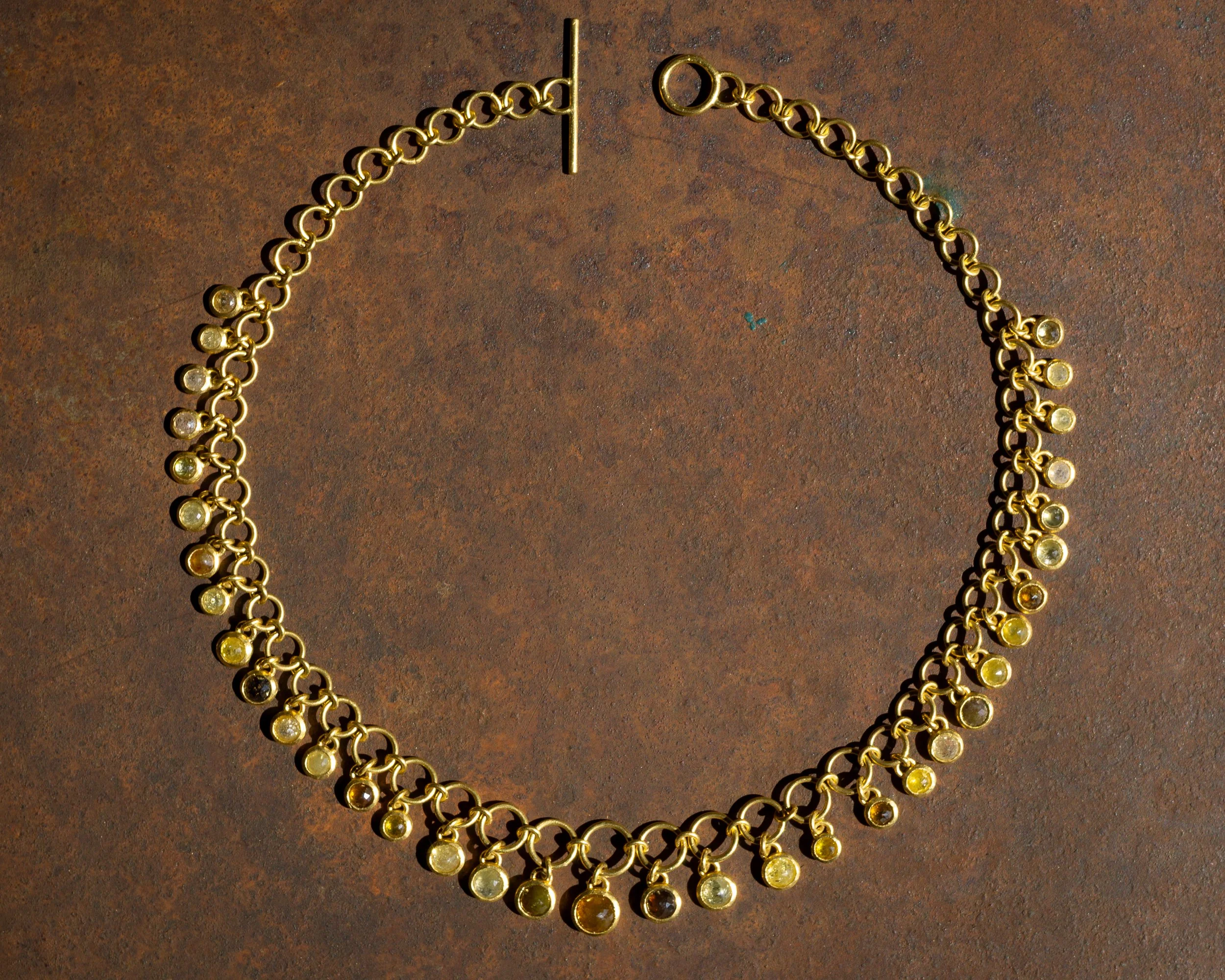 Dawn Necklace shown full view on table.