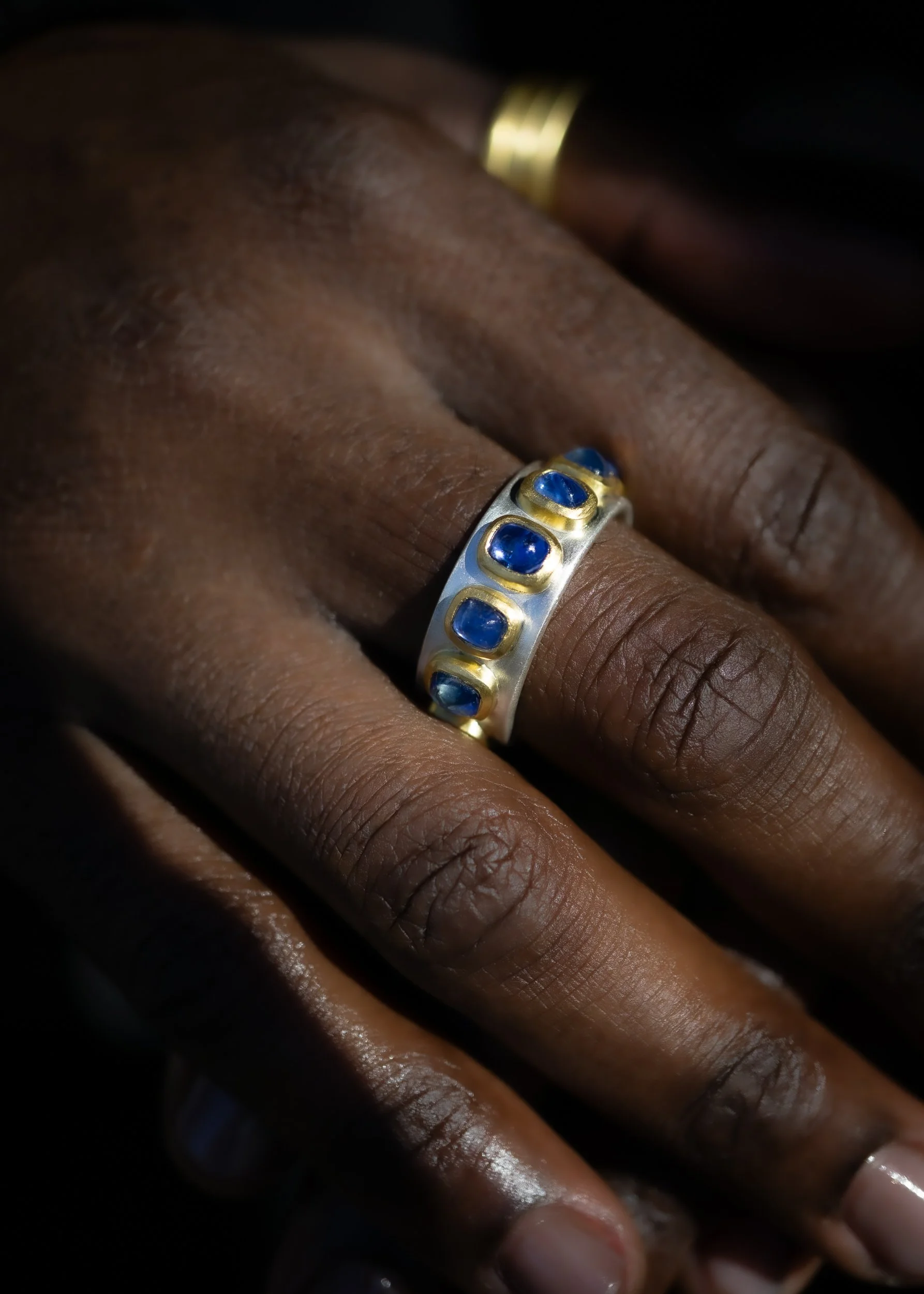 Pleiades Ring angled on the hand.